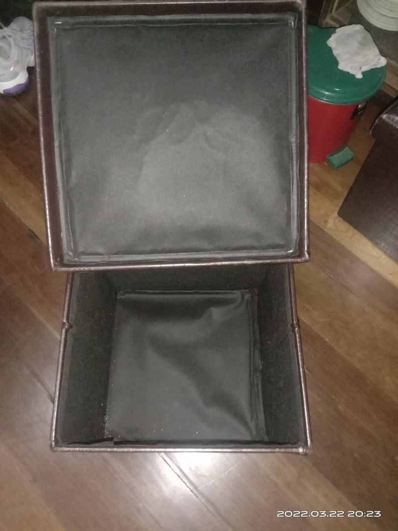 Foldable Stool Storage (Category: Chairs) located in Rizal. Submitted by ZhangYisha (Listing ID 1150556179, Image 3). Description: 2 pieces foldable maroon stool storage. That you may put things like throw pillows, beddings, blanket or just anything. Just beware that this kind of chair should be supported at the bottom if you are planning to carry this with something heavy inside..