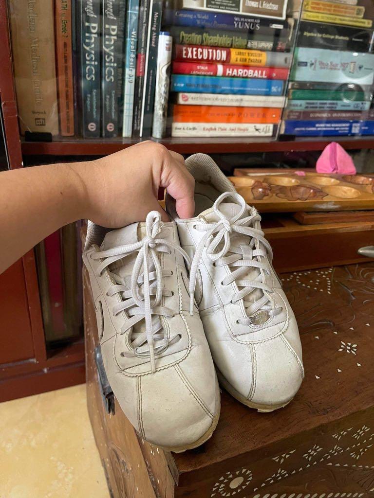 all white cortez womens