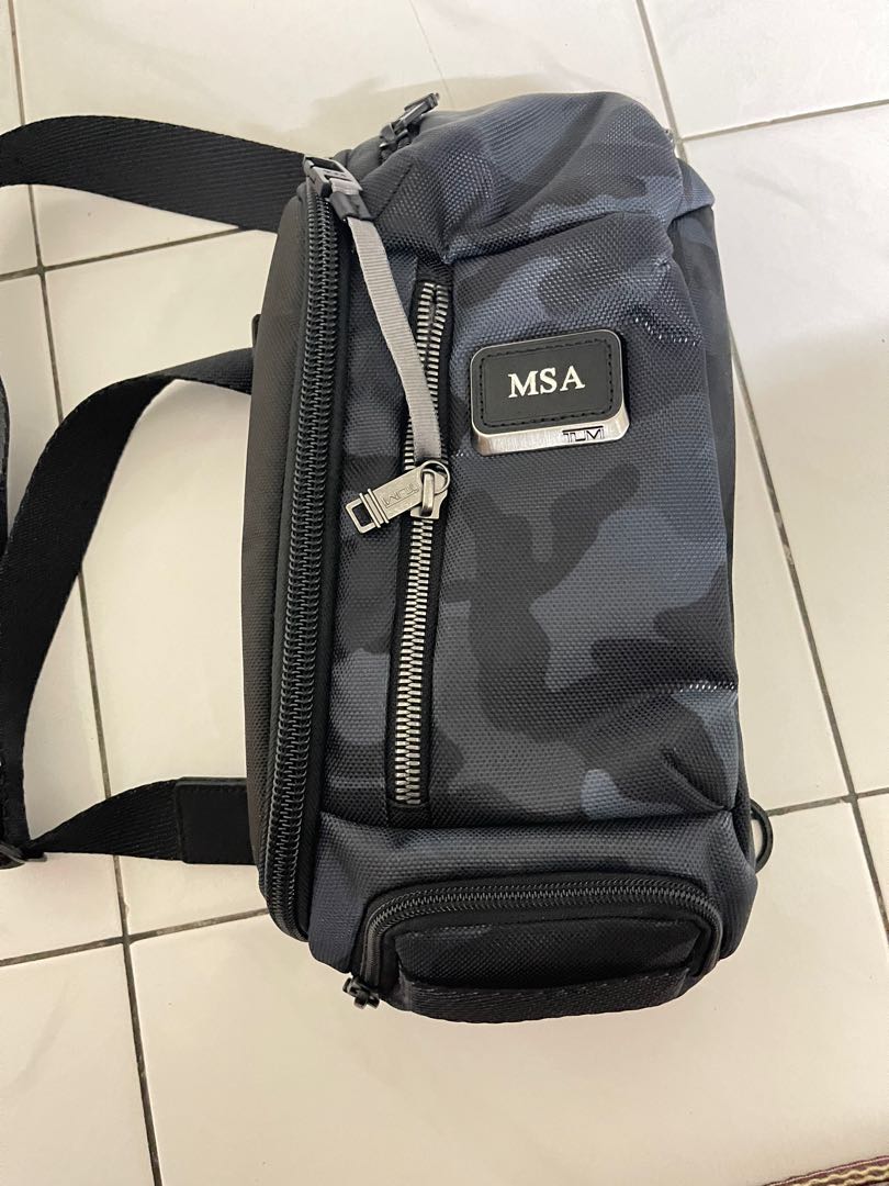 Tumi camo sling bag top