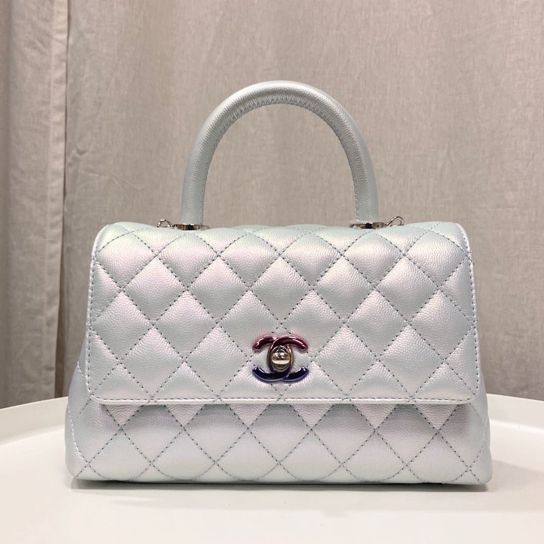 Authentic Chanel Iridescent Blue Small Coco Handle bag in Caviar and  Rainbow Hardware, Luxury, Bags & Wallets on Carousell