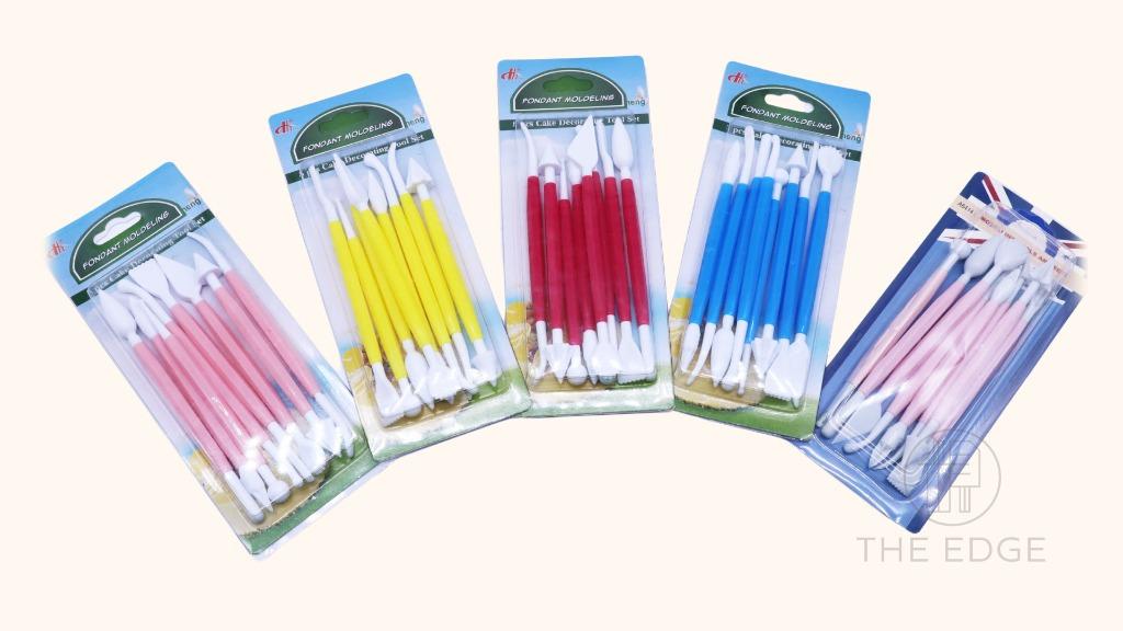 Fondant Modeling Set - 8 pcs. (Category: Bakeware) located in Pasig City. Submitted by kitchenstarincorporated (Listing ID 1150671324, Image 1). Description: Fondant Modeling Set - 8 pcs. Color: Pink, Light Pink, Yellow, Blue, Red Packaging Include: 1 x bone-shaped 1 x shell / blade-shaped 1 x Ball 1 x Scallop and comb-shaped Tool 1 x Bulbulous Cone Tool 1 x Tapered Cones 5/6 Star Tool 1 x Flower/Leaf Shaper Tool 1 x Serrated & Tapered Cone Tool.