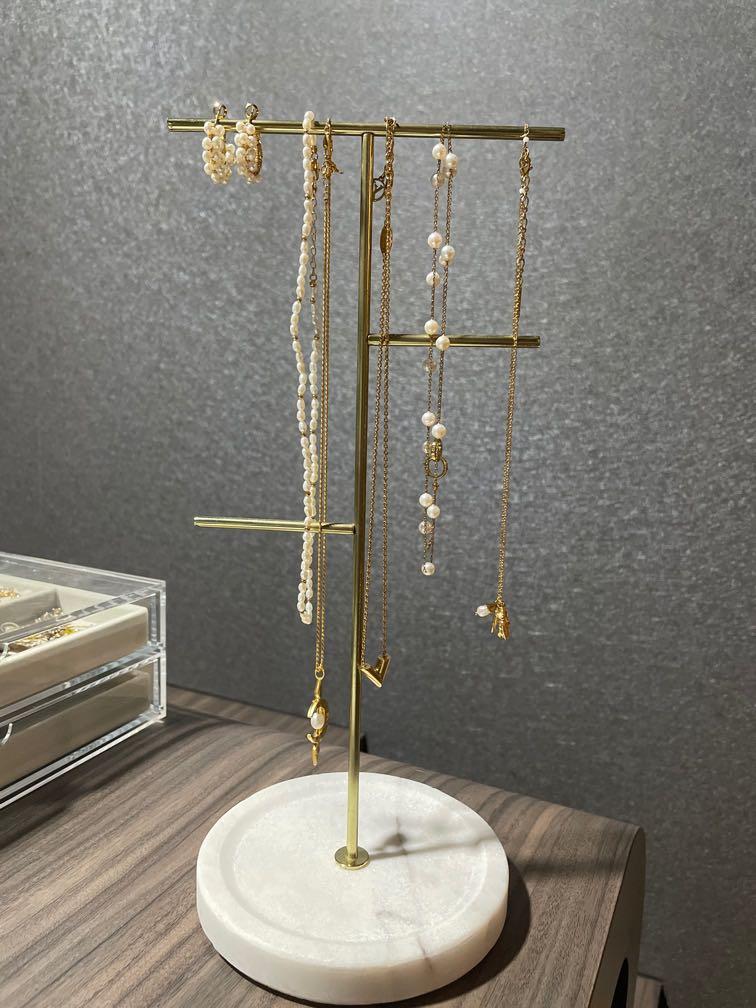 Gold and marble outlet jewelry stand
