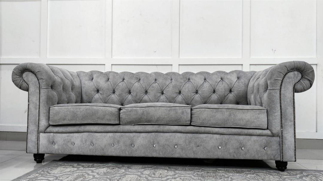 Small grey top chesterfield sofa
