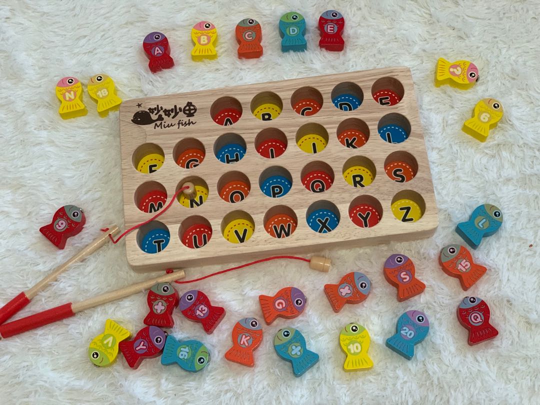 https://media.karousell.com/media/photos/products/2022/3/23/wooden_magnetic_fishing_game_1648032432_b091760d.jpg