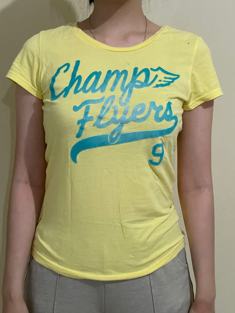 green and yellow champion shirt