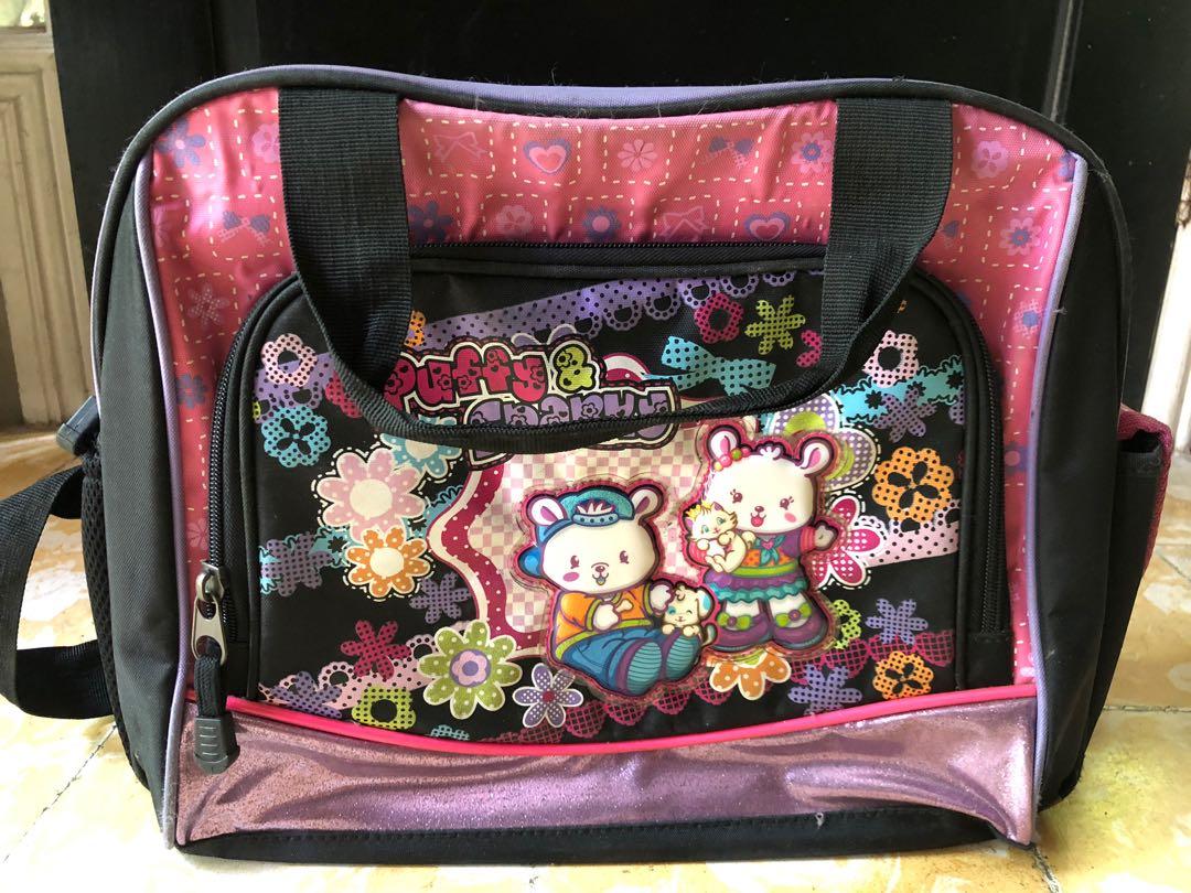 School bag (Category: Backpacks) located in Makati City. Submitted by _skull_ (Listing ID 1150861548, Image 1). Description: Hawk bag “Puffy and Sparky” - can fit 5 textbooks or 10 notebooks - shoulder or handbag .