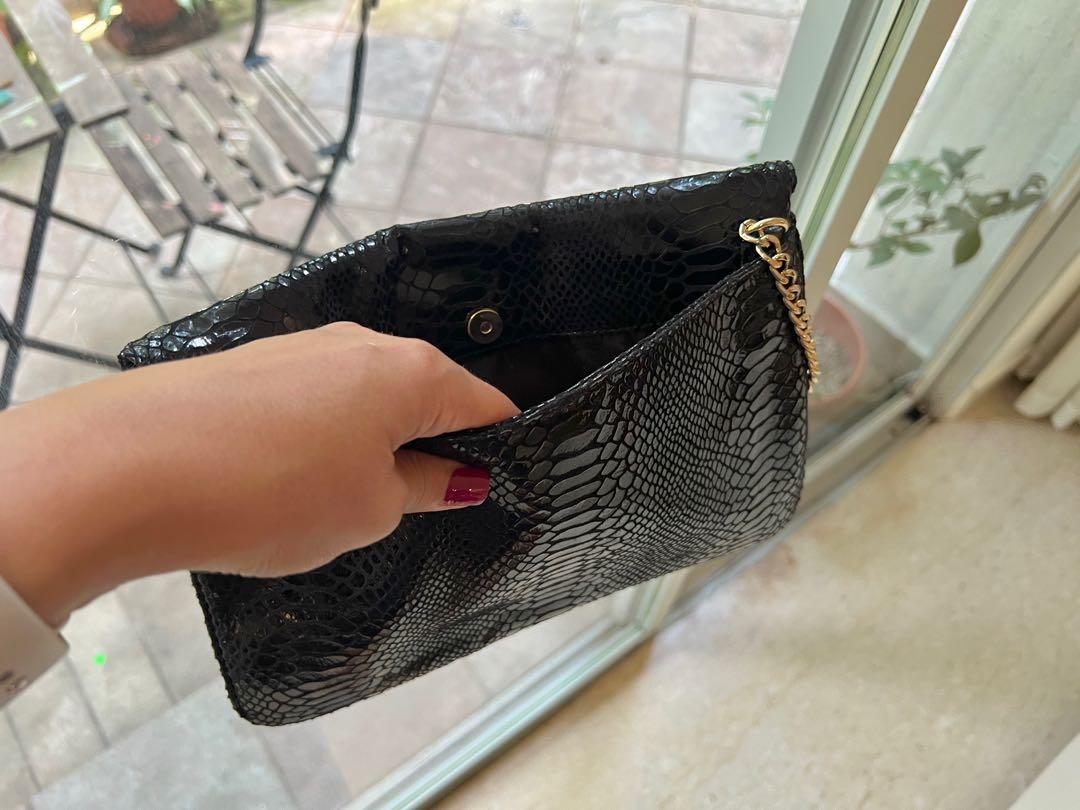 Michael kors best sale black snakeskin clutch