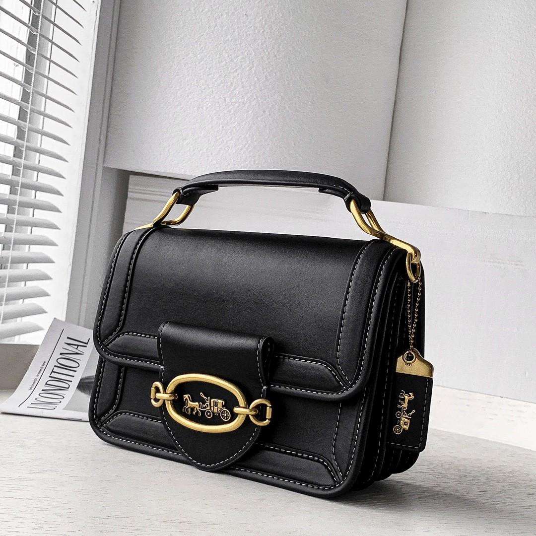 Black coach bag hotsell with horse and carriage