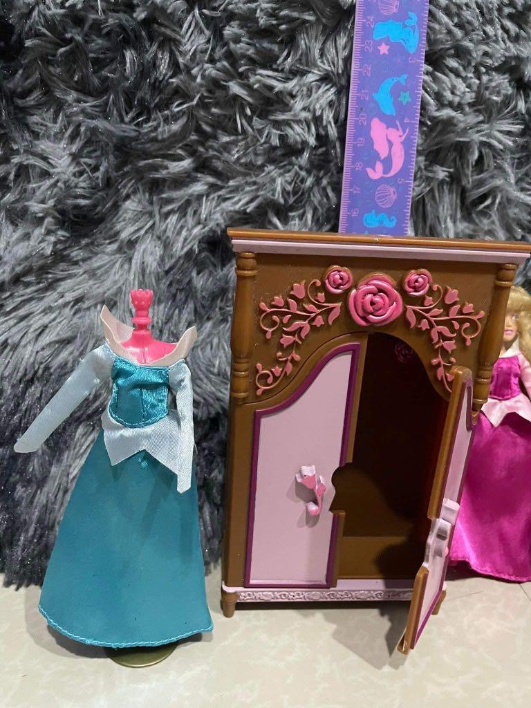 Elsa and aurora toy (Category: Kids Toys) located in Imus. Submitted by pocketfullofcandies (Listing ID 1151053656, Image 2). Description: Frozen elsa and aurora doll with extra clothes, manewuin, cabinet, and a bed with flaw sa leg part. Doll in good condition. Cabinet is very cute .