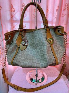 lovecat sling bolsa price