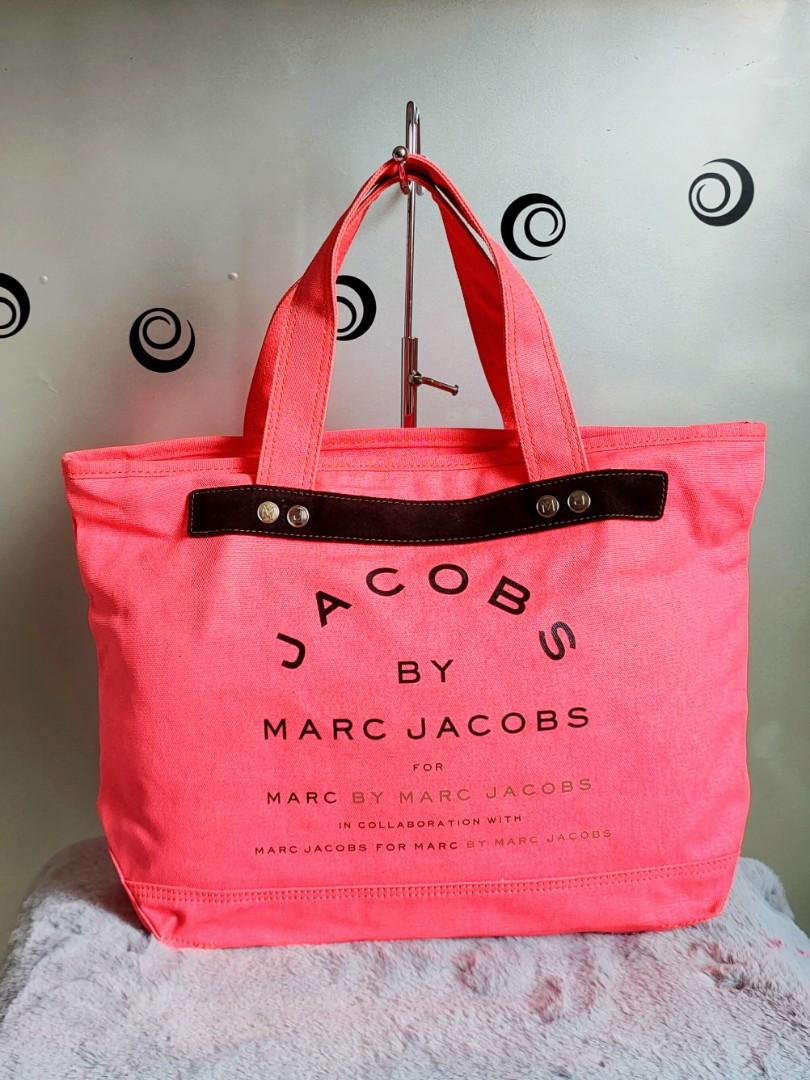 Marc Jacobs Tote bag in Neon Pink (Category: Luxury Bags & Wallets) located in Tuguegarao City. Submitted by roab_ (Listing ID 1151049104, Image 1). Description: Tote bags are versatile bags. It give you the option to go to class, or to go to the gym but also spontaneously stop by the farmer's market on your way home. Grab this really nice Neon Pink tote bag by Marc Jacobs! The dimensions are approximately 18.5" top length X 12" height X 5.5" wid