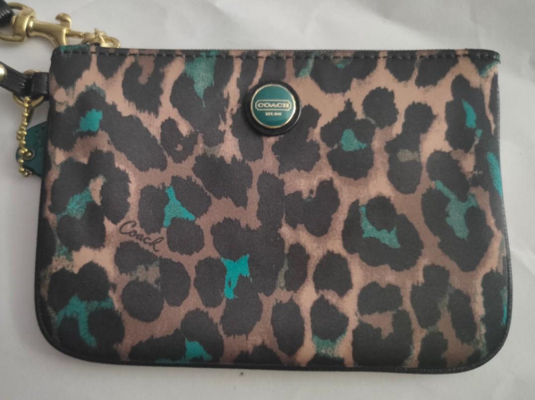 Coach ocelot wristlet discount