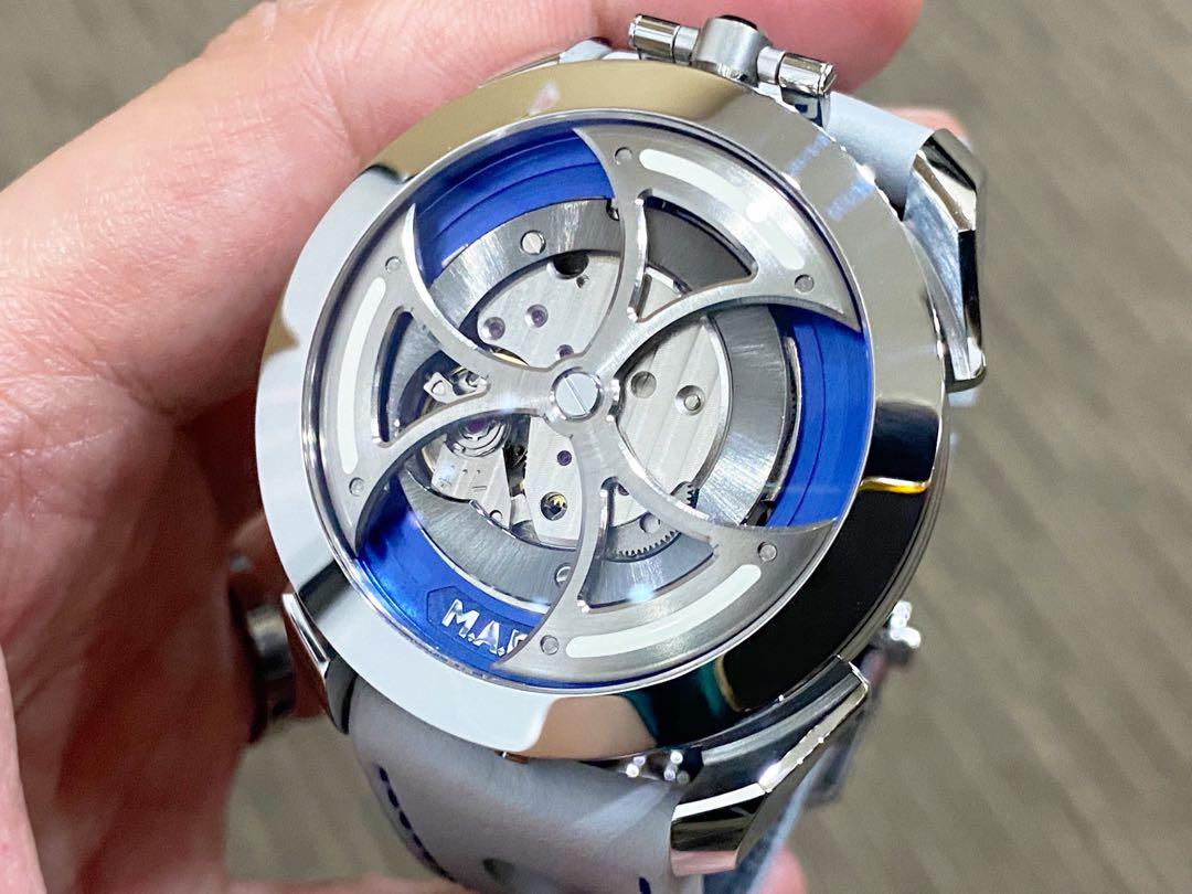 Like New Complete MB&F MAD 1 M.A.D 1 Blue (Category: Watches) located in Singapore. Submitted by thetimeco (Listing ID 1151217364, Image 2). Description: Hello guys! Up for grab and only worn less than 3 times in a like new condition, the unique battle axe rotor and time reading from the side in a 42mm MB&F Mad 1 watch produced and available only to the members of MB&F! Comes in a complete set dated 2021. Condition of timepiece at 9.9 / 10 ——————