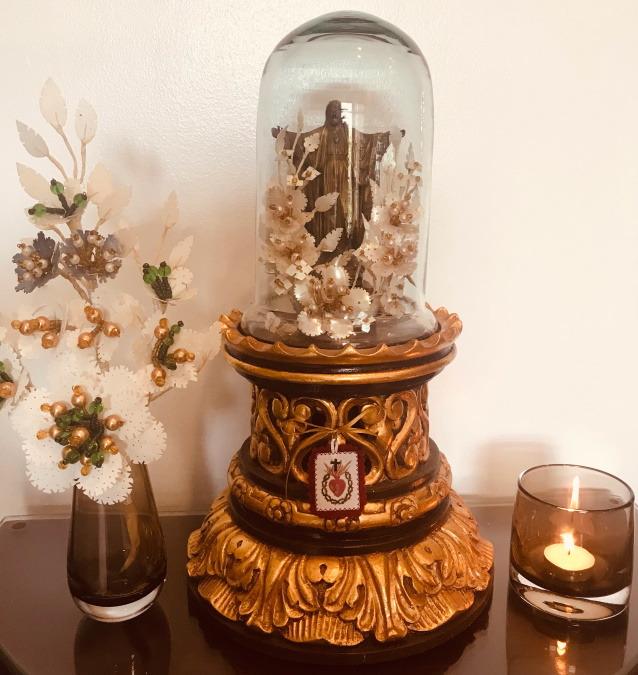 AN ANTIQUE FRENCH GLASS AND GILDED BRASS SACRED HEART VASE