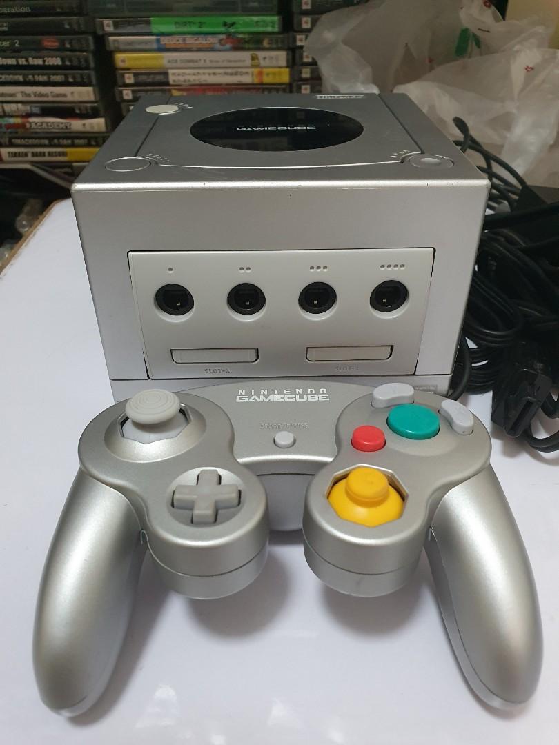 Silver Nintendo Gamecube (complete set) (Category: Nintendo) located in Quezon City. Submitted by itemsforadoption (Listing ID 1151337661, Image 2). Description: Rfs: Its 2022! Happy New Year everyone. Now is a time to be joyous and declutter. And I'm doing just that this season. If you're interested in a game, I'm also will to accept trade in like trading old games for a newer one. Just send a message my way Item Description: Rare Silver Gamecub