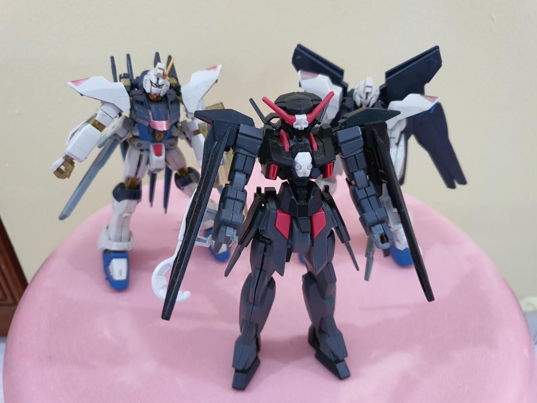 Assorted Gundam figures (Category: Gundam Model Kits) located in Singapore. Submitted by kurohami (Listing ID 1151485984, Image 3). Description: Big figure 17cm tall while the other 3 are 12cm tall. Big one at $25. Small one at $15. Collect at Tampines East MRT..