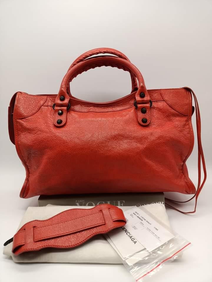 Balenciaga Regular City Bag (Category: Luxury Bags & Wallets) located in Manila. Submitted by bagislifeshop (Listing ID 1151413809, Image 2). Description: ▪️Balenciaga Regular City Bag▪️ ☑️Available in Bacolod ✅Material: red-orange lambskin leather ✅Condition: 8.8/10 ✅Inclusion: dustbag, cards and short strap.