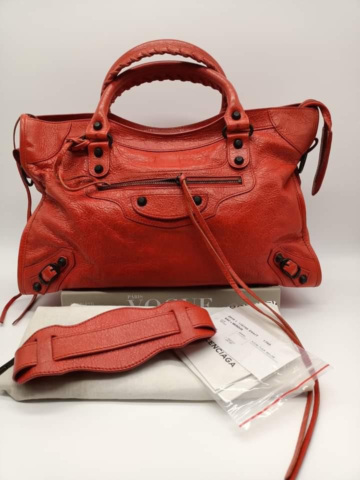 Balenciaga Regular City Bag (Category: Luxury Bags & Wallets) located in Manila. Submitted by bagislifeshop (Listing ID 1151413809, Image 1). Description: ▪️Balenciaga Regular City Bag▪️ ☑️Available in Bacolod ✅Material: red-orange lambskin leather ✅Condition: 8.8/10 ✅Inclusion: dustbag, cards and short strap.