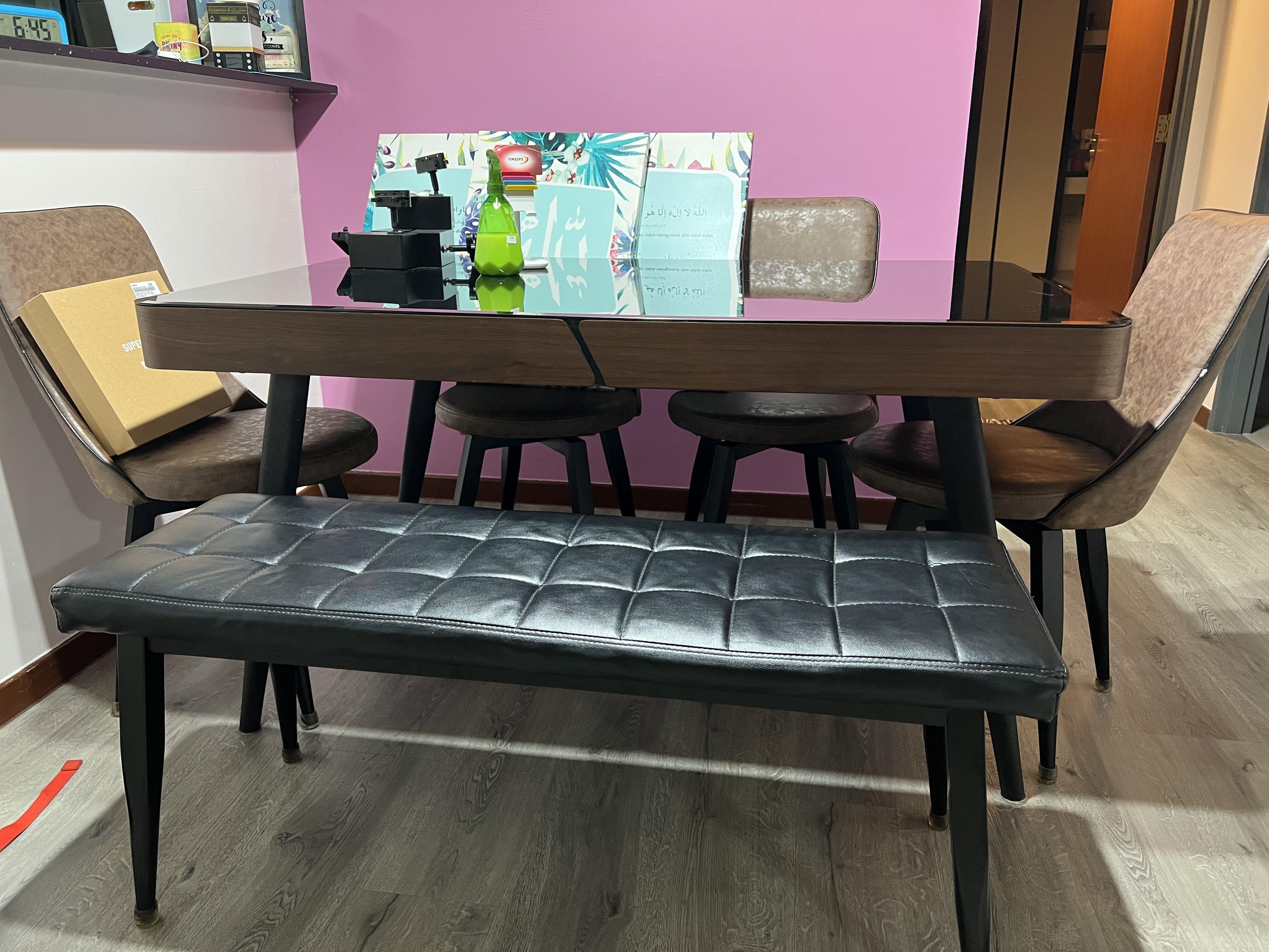 Dining table (Category: Tables & Sets) located in Singapore. Submitted by shophophop (Listing ID 1151605475, Image 1). Description: Black coasted glass top + walnut veneer with black powder coated legs L 1450 x W 800 x H 730 mm Will throw in the chairs for free. Chairs condition 6/10 Arrange own transport.