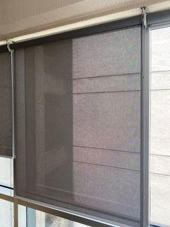 Light gray roller blinds