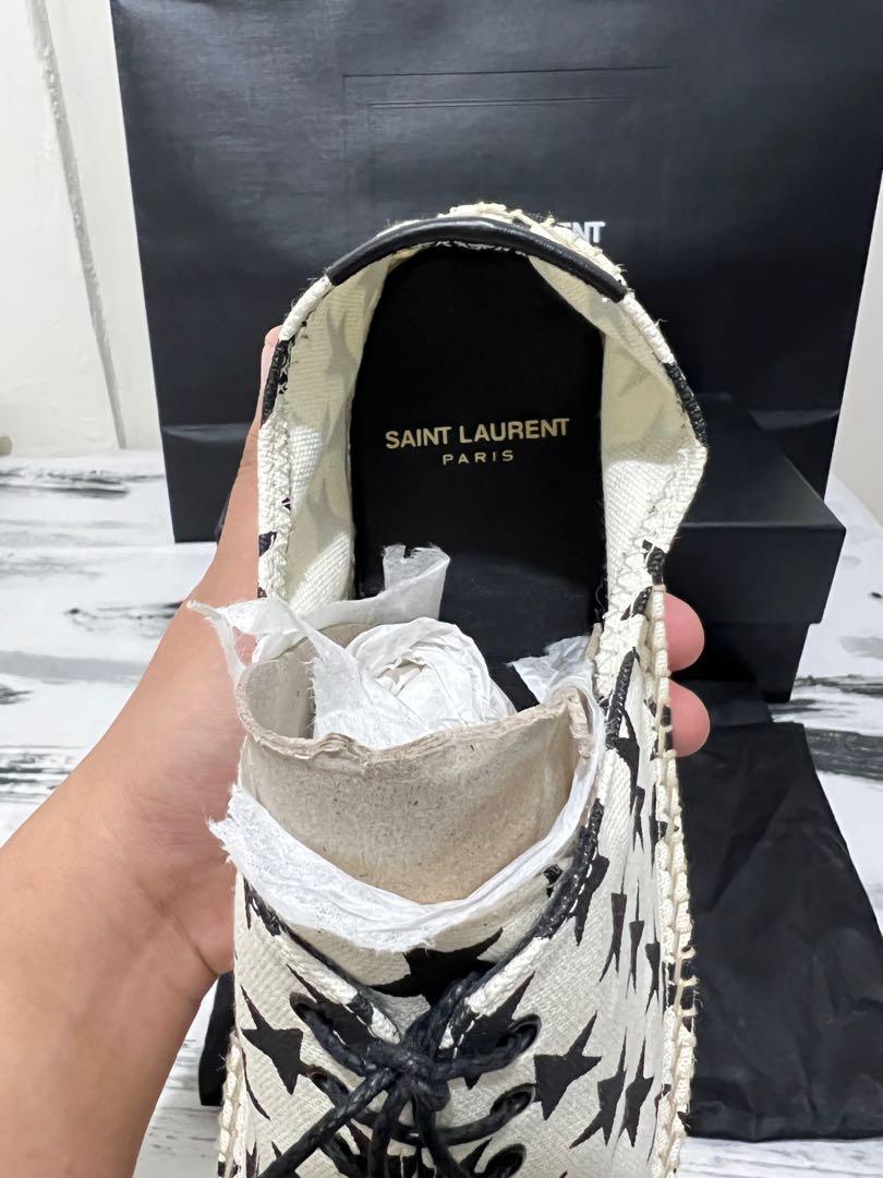 Saint Laurent espadrilles (Category: Sneakers) located in Imus. Submitted by erisoncelovesph (Listing ID 1151571996, Image 3). Description: 💯 authentic Saint Laurent canvas espadrilles star Unisex. Perfect this summer season! ☀️ Size: EU 42 / US 9 / UK 8 / 27 cm Original price of P39,500. Used once. Complete inclusion: Box, dust bags, paper bag and care card. Free shipping. 200% money back if proven fake..
