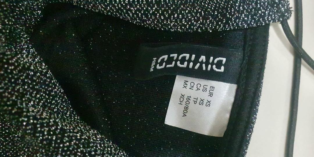 H&M Crop top (Category: Sleeveless) located in Quezon City. Submitted by rafdeclutter (Listing ID 1151749782, Image 2). Description: Used once. this top is flattering.