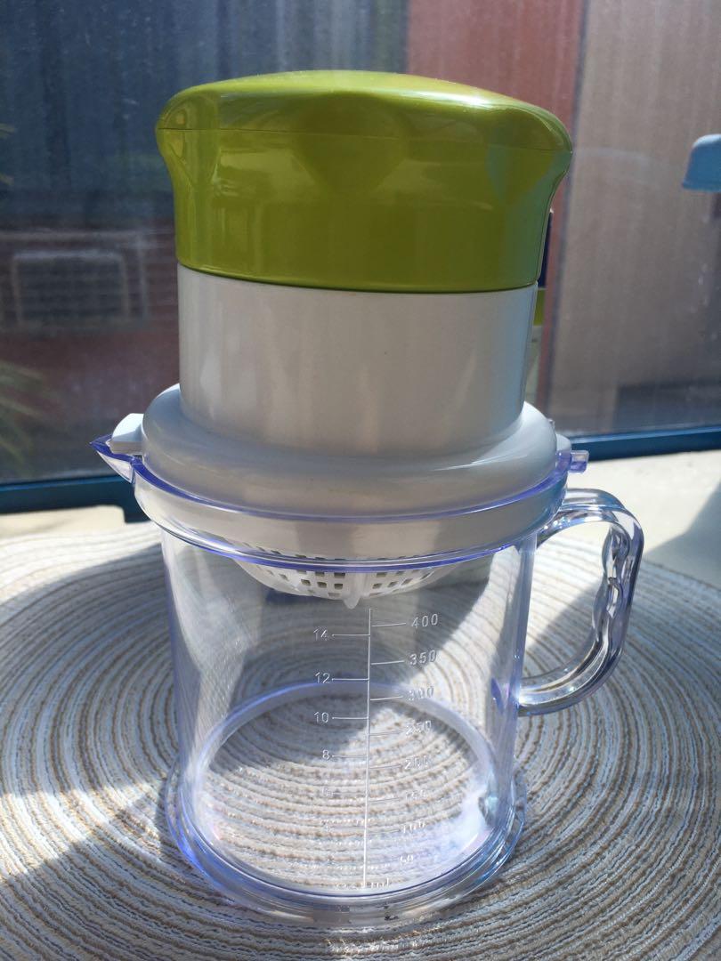 Oster multi-purpose hand juicer (Category: Other Kitchenware & Tableware) located in San Juan City. Submitted by iambernie (Listing ID 1151616017, Image 3). Description: 2 way operation suitable for various fruits Clear cup has measurement markings Put small pcs of fruit such as grapes, strawberries, apples into the basket. Press cover on the top of the fruit then twist back and forth Never used, just stored Turn the basket upside down for regula
