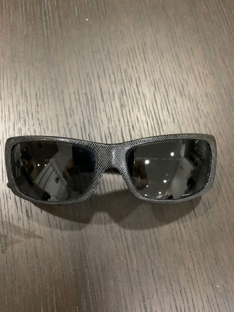 Prada sunglasses made in Italy Women s Fashion Watches