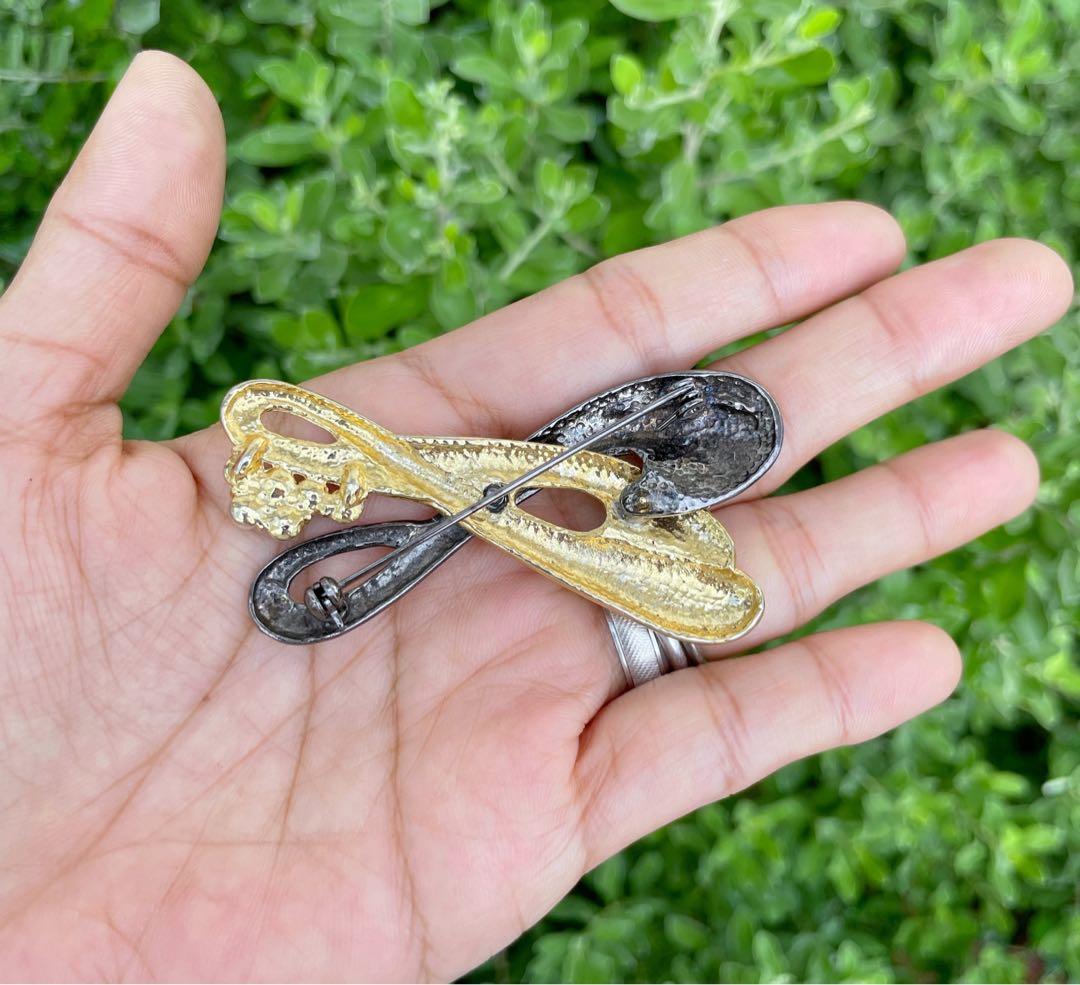 Infinity brooch on sale