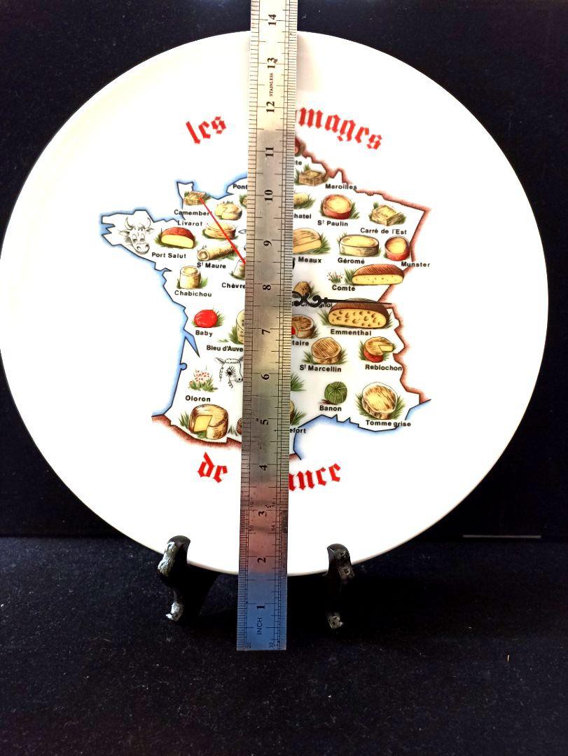 Vintage Ceramic Wall /Table Clock, Made In France (Category: Clocks) located in Davao. Submitted by papa1919 (Listing ID 1137647729, Image 2). Description: Highly collectible, especially for cheese lovers and connossieurs. Mint - no cracks or chips. The last 3 photos in the gallery shows a rod handle which came with this collectible plate. So, it seems that this item could be a cheese platter which its original owner converted into a wall clock f