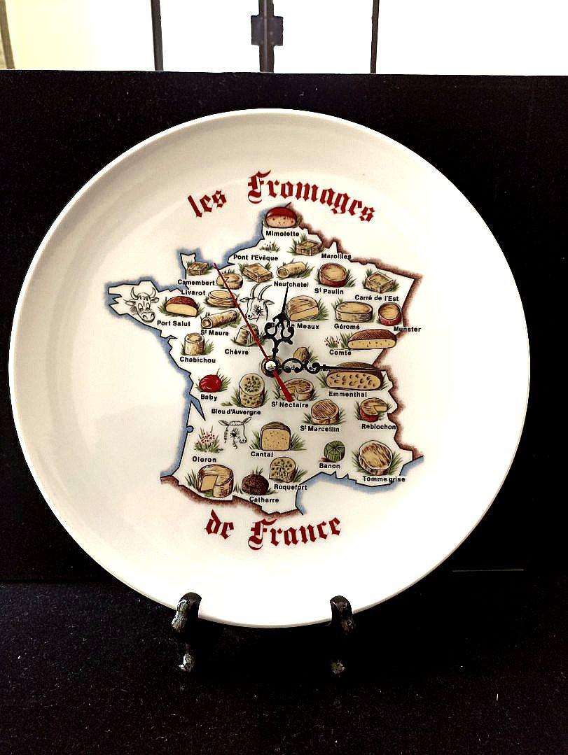 Vintage Ceramic Wall /Table Clock, Made In France (Category: Clocks) located in Davao. Submitted by papa1919 (Listing ID 1137647729, Image 1). Description: Highly collectible, especially for cheese lovers and connossieurs. Mint - no cracks or chips. The last 3 photos in the gallery shows a rod handle which came with this collectible plate. So, it seems that this item could be a cheese platter which its original owner converted into a wall clock f
