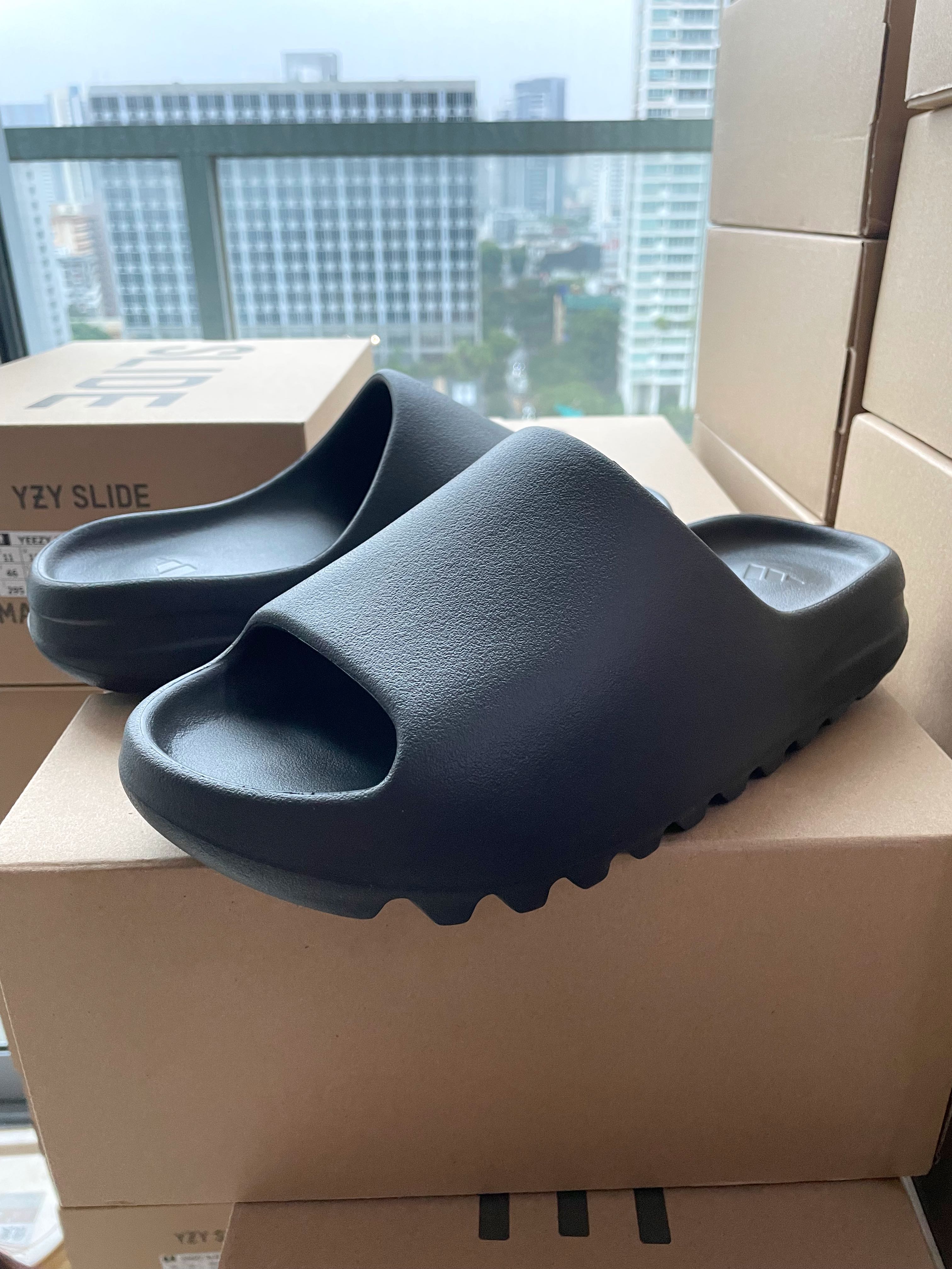 Yeezy Slides Onyx, Men's Fashion, Footwear, Flipflops and Slides on  Carousell