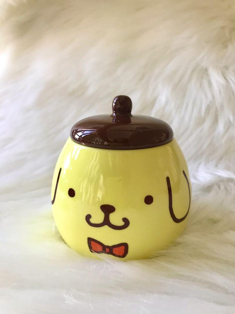 Authentic Sanrio Pompompurin Mug/ Small Pot/ Jar with Lid (Category: Other Kitchenware & Tableware) located in Cebu City. Submitted by kawaiiparty (Listing ID 1151883659, Image 2). Description: Brand New with Box Authentic Sanrio Japan For coffee, tea, sugar, candies, soup etc. Super cute ⭐️🐶 💟Pls read: ✅All imported items are authentic and are personally curated. ✅Pls understand that prices depend on their RARITY, item weight, shipping FEES, f