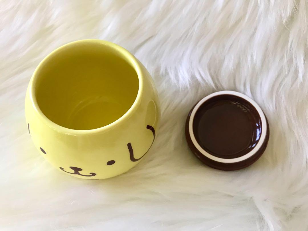Authentic Sanrio Pompompurin Mug/ Small Pot/ Jar with Lid (Category: Other Kitchenware & Tableware) located in Cebu City. Submitted by kawaiiparty (Listing ID 1151883659, Image 3). Description: Brand New with Box Authentic Sanrio Japan For coffee, tea, sugar, candies, soup etc. Super cute ⭐️🐶 💟Pls read: ✅All imported items are authentic and are personally curated. ✅Pls understand that prices depend on their RARITY, item weight, shipping FEES, f