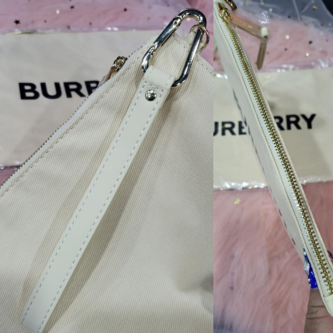 Burberry Wristlet slim pouch, Women's Fashion, Bags & Wallets on Carousell