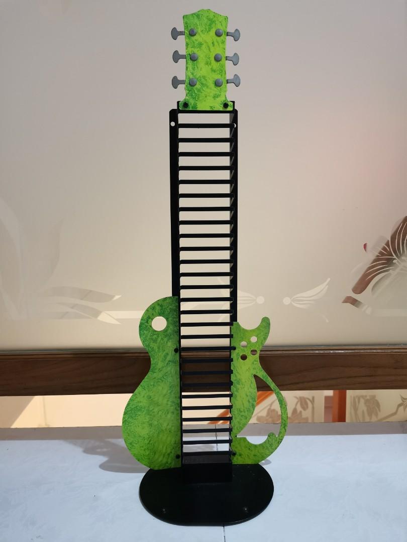 Metal guitar CD rack., Hobbies & Toys, Music & Media, Musical