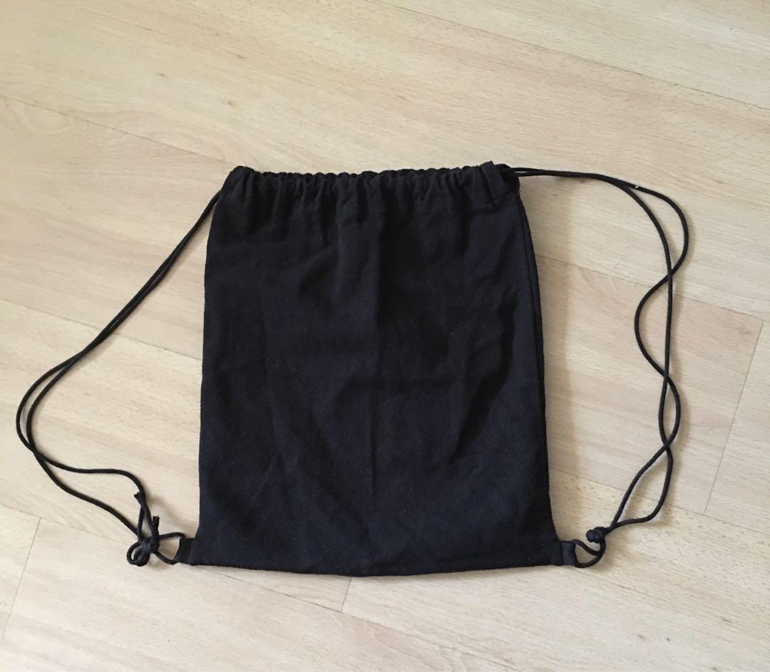 Drawstring bag (Category: Everything Else) located in Singapore. Submitted by applestrudelle (Listing ID 1151828150, Image 1). Description: - simple black canvas drawstring bag pack - have been washed (stored it for quite some time) DM for details! meet-ups/mailing available :) .