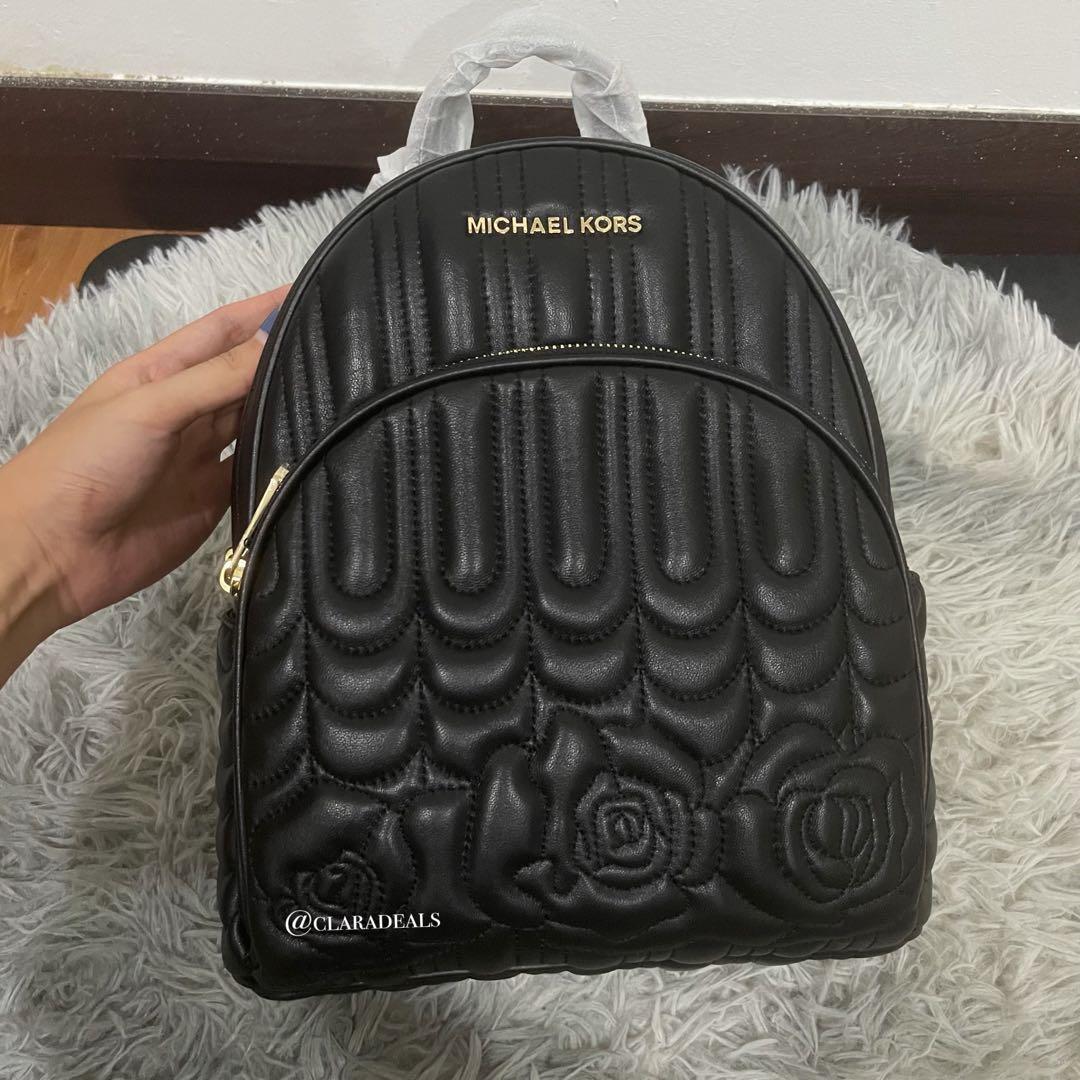 Michael kors backpack with roses hot sale