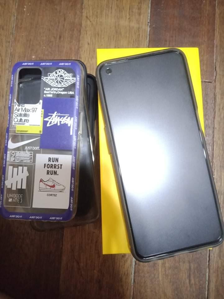Realme 8 5g (Category: Realme) located in Pasay City. Submitted by razzelejulien (Listing ID 1151892891, Image 1). Description: Complete with Box and charger. 5 phone cases.