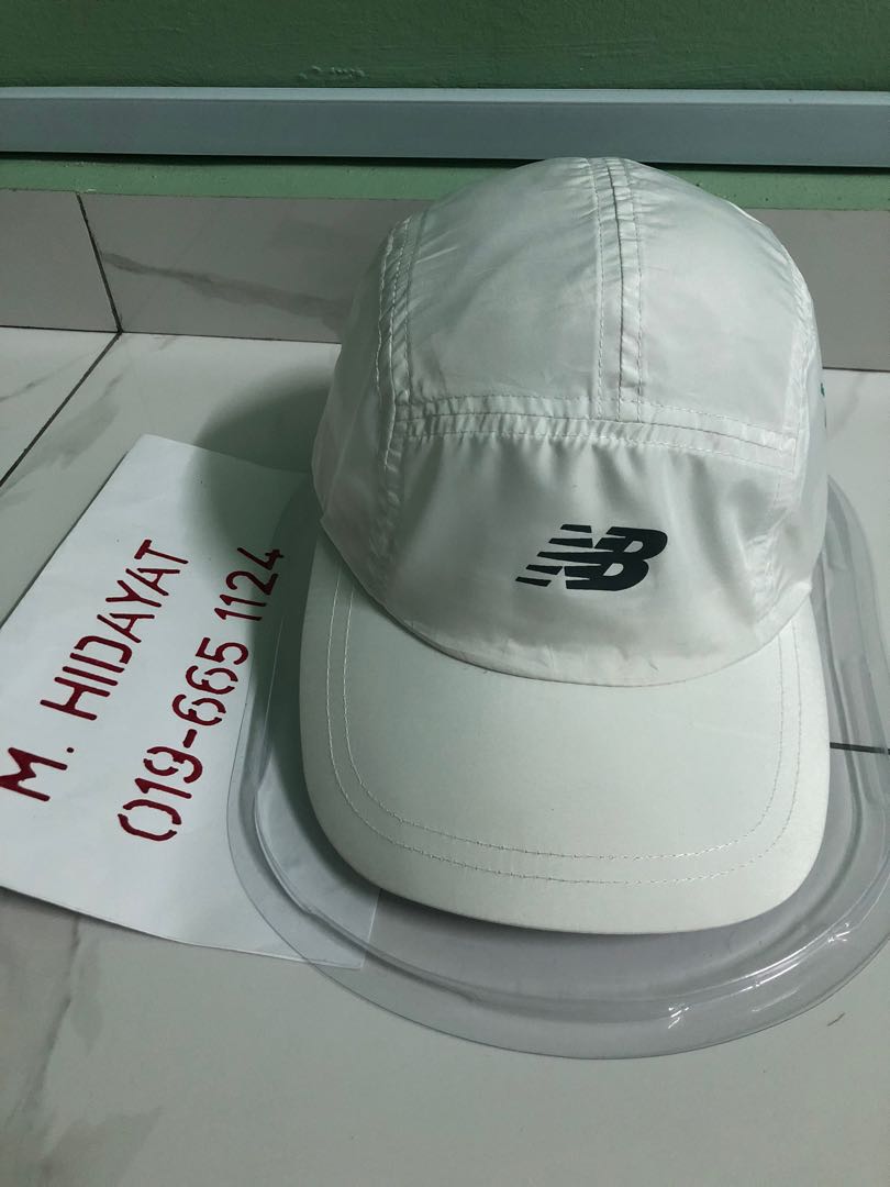 Topi New Balance running cap on Carousell