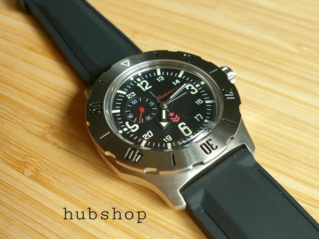 Vostok Komandirskie K35 watch on the left black dial sub second. Free delivery