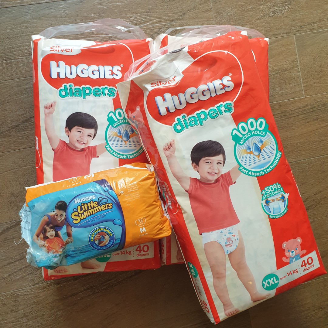 Huggies XXL tape diapers and M Swimpants, Babies & Kids, Bathing