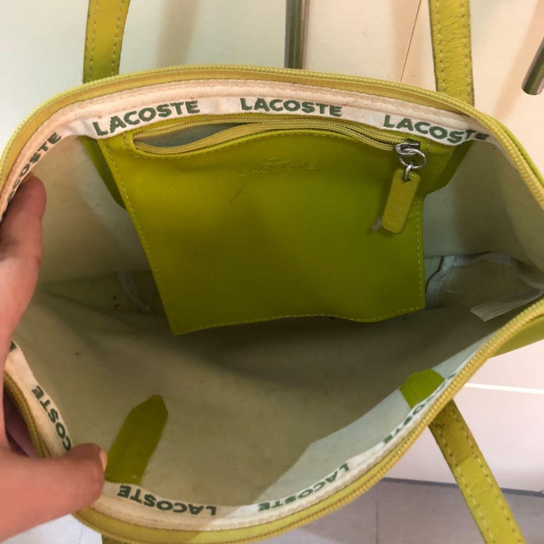 Lacoste small bag (Category: Shoulder Bags) located in Cavite. Submitted by raspberrygurl (Listing ID 1146760905, Image 2). Description: With flaw pero sa likod din at di halata and with signs of usage.