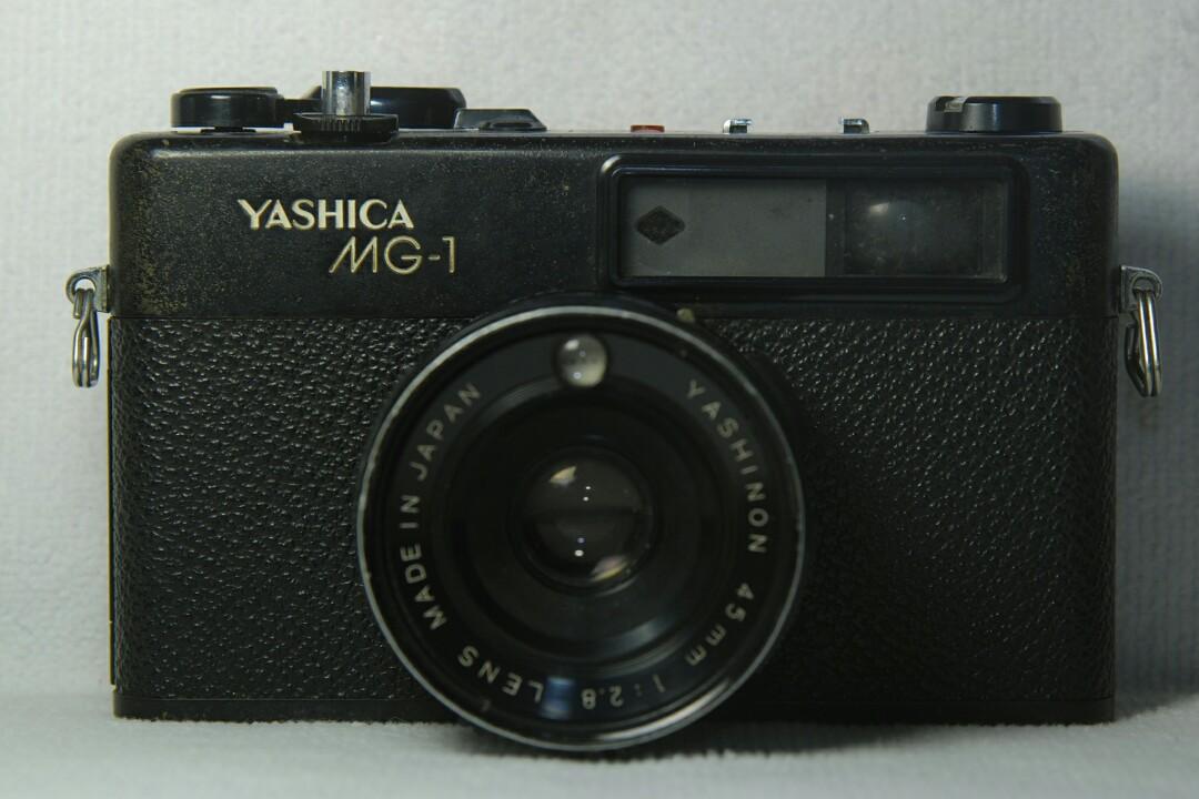 Yashica MG-1 Rangefinder Camera (Category: Cameras) located in Quezon City. Submitted by Mr._Vintageous (Listing ID 1146801747, Image 1). Description: For Sale! Yashica MG-1 Rangefinder Camera. 45mm f/2.8 Lens. Aperture Working, Focus Ring Working, Clean Viewfinder, Working Self-Timer Switch. Built like a tank. No batteries for lightmeter. Still useable without lightmeter. Made in Japan. Actual pictures posted. Meet up Fairview Terraces Mall or S