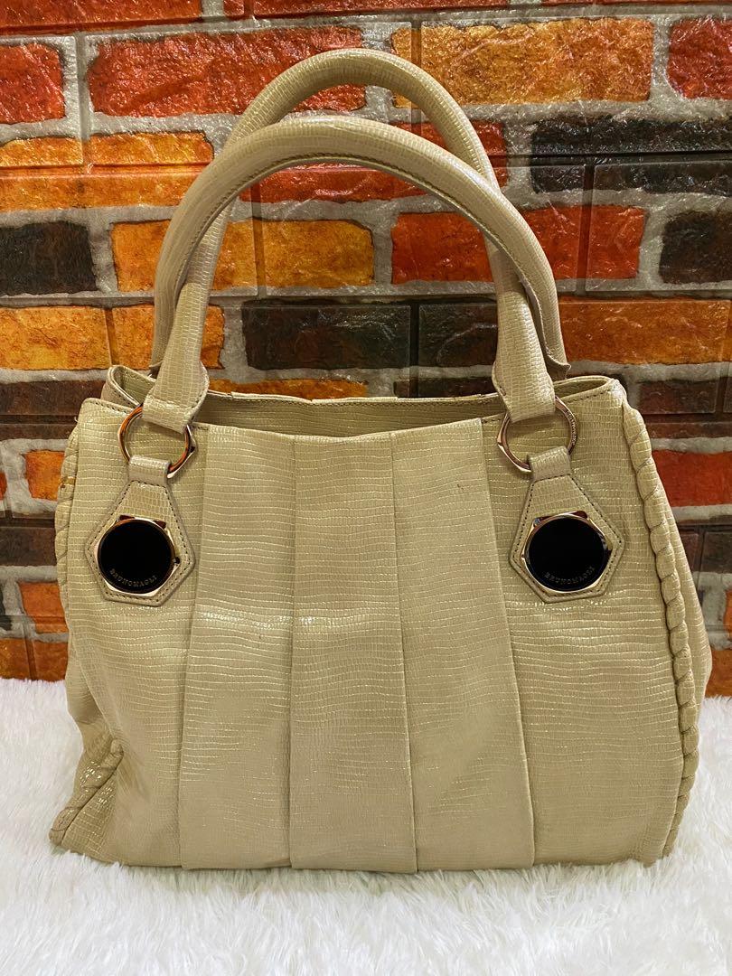 Authentic Bruno Magli Snakeskin Hobo bag (Category: Luxury Bags & Wallets) located in Cagayan de Oro. Submitted by riggstuffs (Listing ID 1152118969, Image 1). Description: Guaranteed Authentic Bruno Magli Snakeskin Hobo Bag It is in cream color and material is made of soft snakeskin leather No major flaws, no rubs at the corner, no rips or cracks in the material A little sign of use The Interior is very clean with 3 compartments Hardware are sti