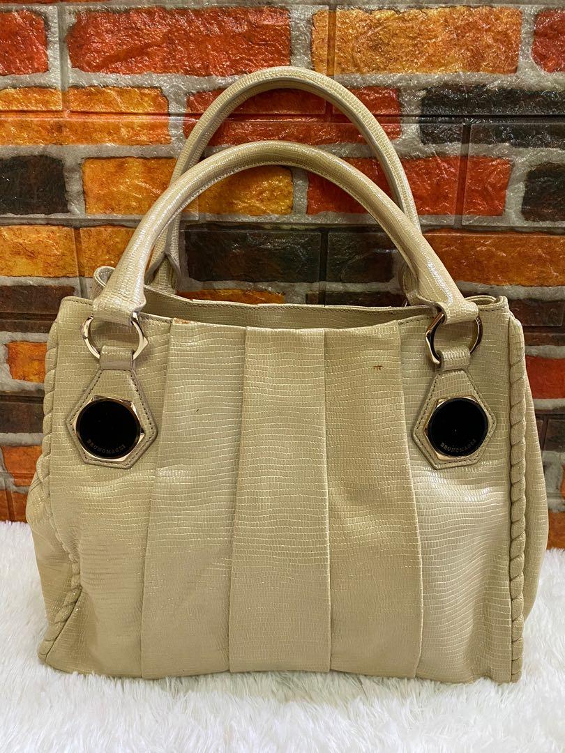 Authentic Bruno Magli Snakeskin Hobo bag (Category: Luxury Bags & Wallets) located in Cagayan de Oro. Submitted by riggstuffs (Listing ID 1152118969, Image 2). Description: Guaranteed Authentic Bruno Magli Snakeskin Hobo Bag It is in cream color and material is made of soft snakeskin leather No major flaws, no rubs at the corner, no rips or cracks in the material A little sign of use The Interior is very clean with 3 compartments Hardware are sti