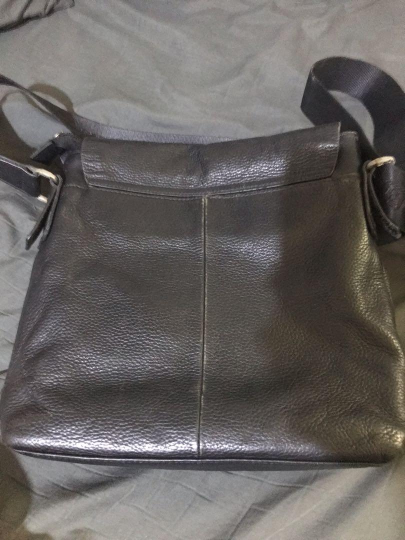 Gold Lion leather sling unisex (Category: Sling Bags) located in Manila. Submitted by kdan29 (Listing ID 1152036497, Image 2). Description: Used Gold Lion sling bag Black Leather Signs of use.
