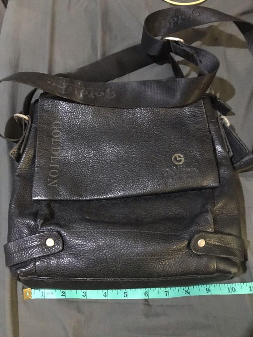 Gold Lion leather sling unisex (Category: Sling Bags) located in Manila. Submitted by kdan29 (Listing ID 1152036497, Image 3). Description: Used Gold Lion sling bag Black Leather Signs of use.