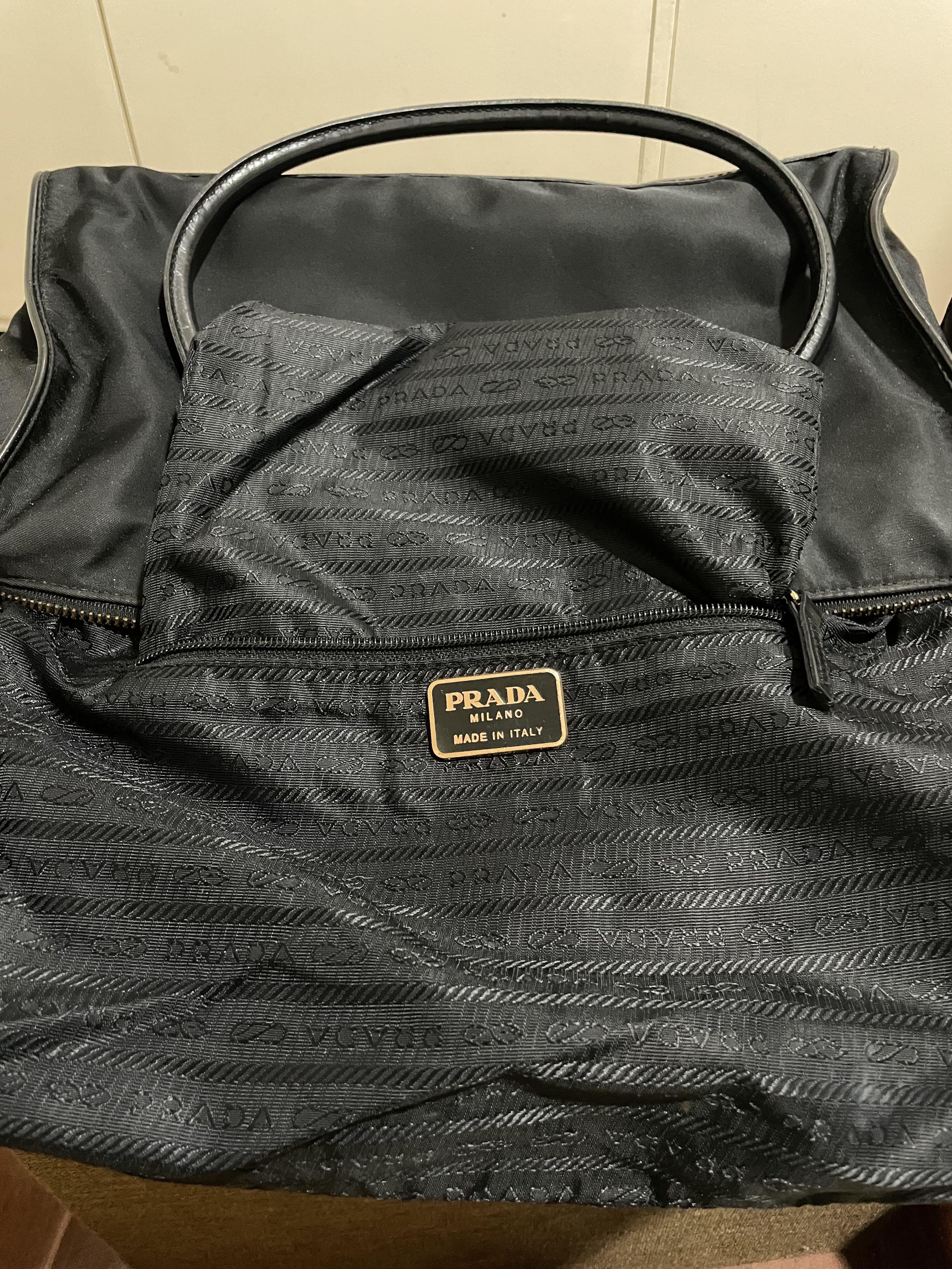 Prada (Category: Luxury Bags & Wallets) located in Valenzuela. Submitted by declutterstuffs0099 (Listing ID 1151222762, Image 3). Description: Prada handbag Naka hologram With lock and key No white tag (vintage) Prada plate Prada zipper.