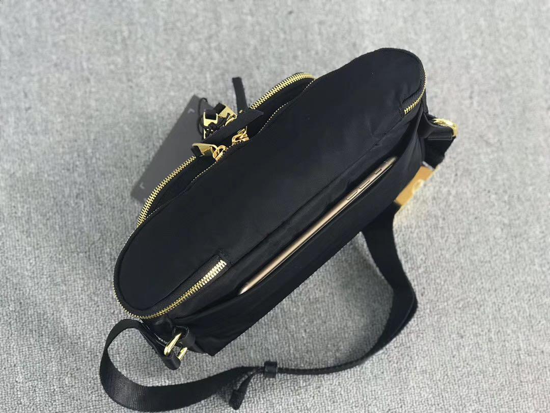 Tumi voyageur outlet madison hip bag